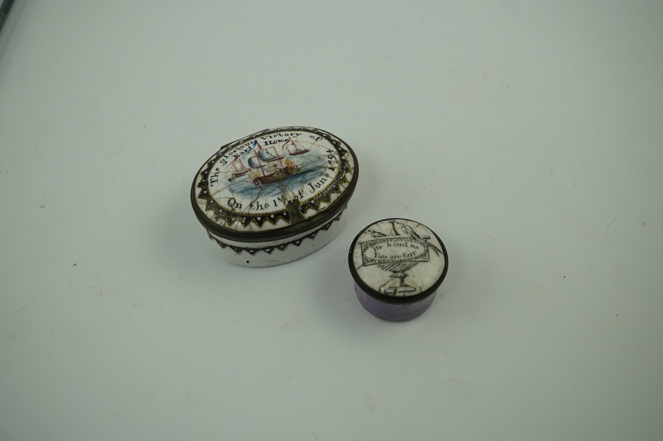 Two 18th century South Staffordshire enamel patch boxes, one inscribed 'The Glorious Victory, Earl Howe, on the 1st of June 1794', the other 'Be Kind as You are Fair', largest 5cm wide. Condition - enamel chipped